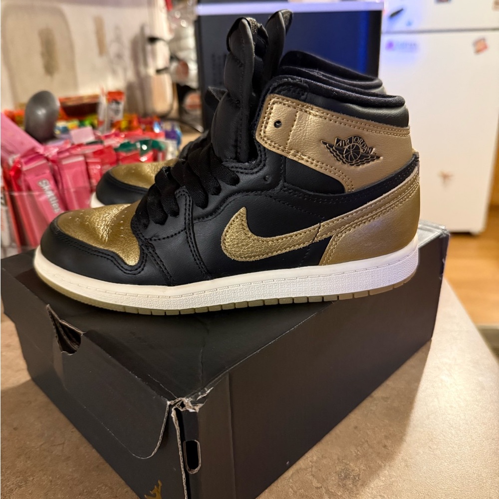 Jordan 1 Retro High OG Black and Metallic Gold